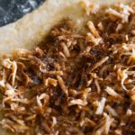 Golden brown fried onions on dough background image & Google Slides Theme