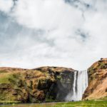 Green Brown Waterfall Sky background image & Google Slides Theme