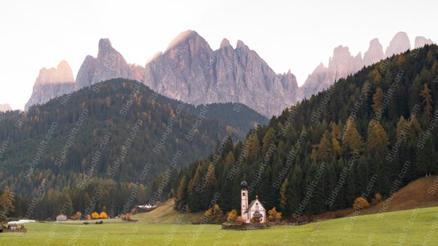 Green Meadow PineTrees GreyMountains PinkWhiteChurch background image