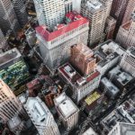 Grey Yellow Skyscrapers Aerial background image & Google Slides Theme