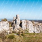 Light Green and Beige Ruined Castle on Limestone Cliffs background image & Google Slides Theme