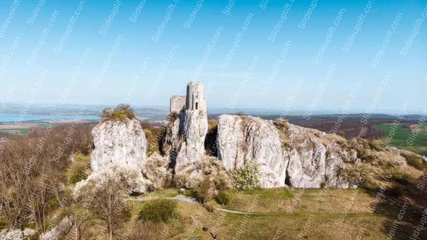 Light Green and Beige Ruined Castle on Limestone Cliffs background image