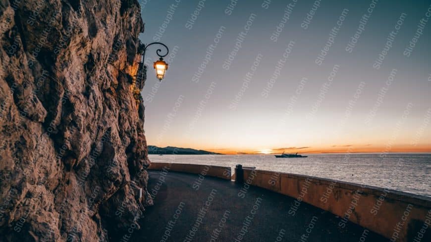 Orange Blue Sunset Ocean Lamppost Seawall background image