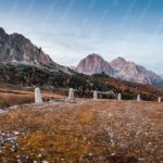 Orange Brown Mountains White Stones Blue Sky background image & Google Slides Theme