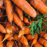 Orange Carrots Green Foliage background image & Google Slides Theme