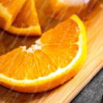 Orange Slice Wooden Board Background Image & Google Slides Theme