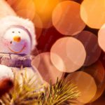 Orange White Snowman Bokeh background image & Google Slides Theme