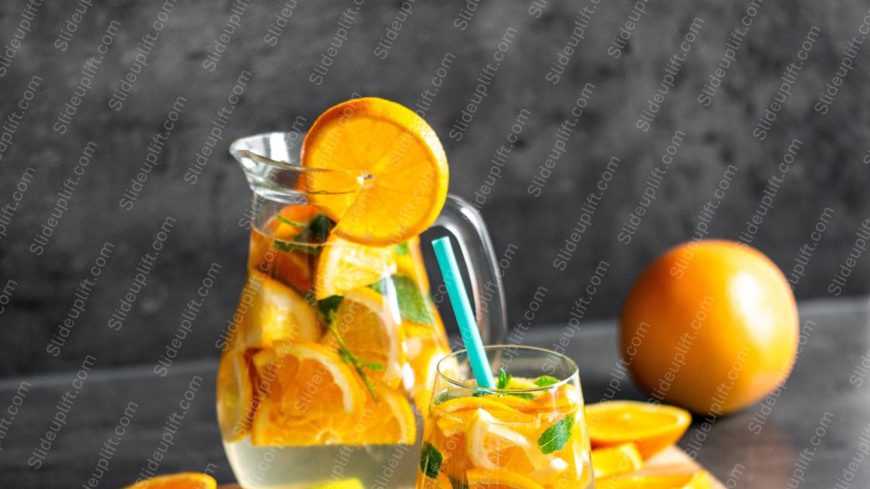Orange and Green Beverage in Glassware background image