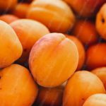 Orange yellow apricots background image & Google Slides Theme