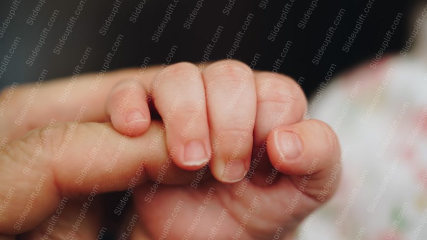 Peach Infant Hand Grasp Dark background image