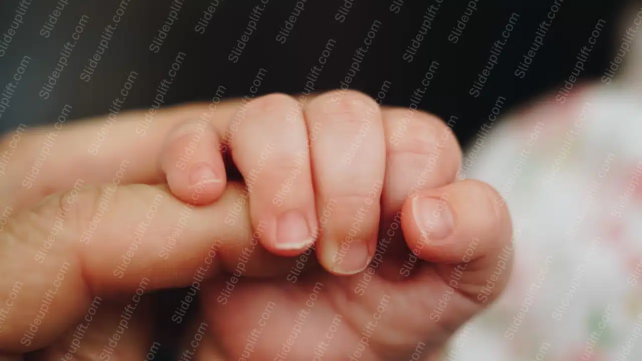 Peach Infant Hand Grasp Dark background image & Google Slides Theme