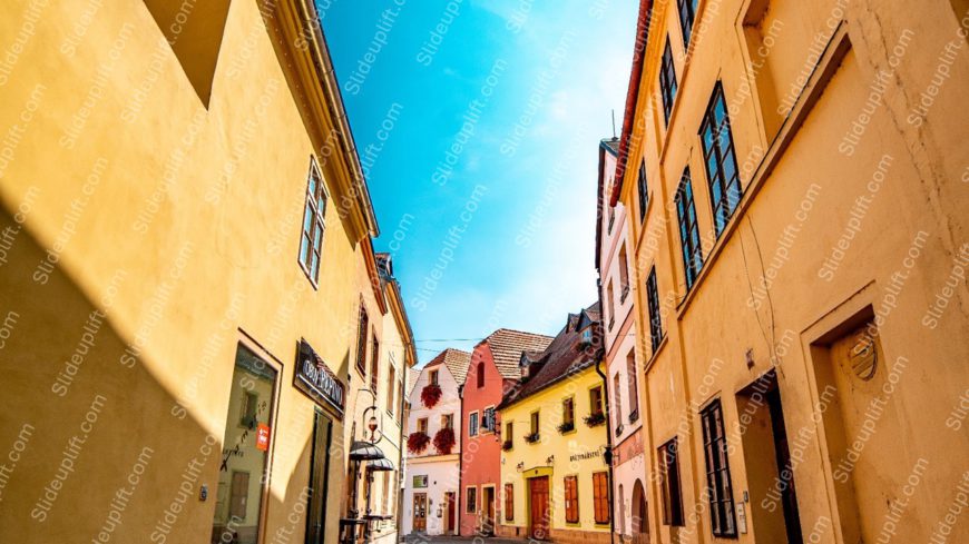 Peach Yellow Traditional Houses Blue Sky background image