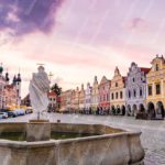 Purple Sky Statue Historic Town Square background image & Google Slides Theme