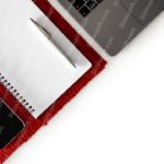 Red Notebook Pen Laptop Smartphone White background image & Google Slides Theme