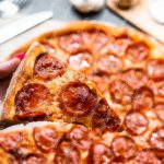 Red Pepperoni Pizza background image & Google Slides Theme