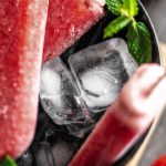 Red Popsicle Transparent Ice Cubes Green Mint Leaves background image & Google Slides Theme