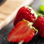 Red Strawberries Wooden and Slate background image & Google Slides Theme