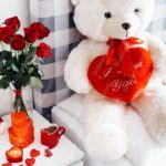 Red roses and teddy bear white background image & Google Slides Theme