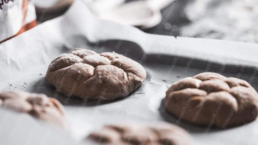 Warm brown cookies on parchment background image