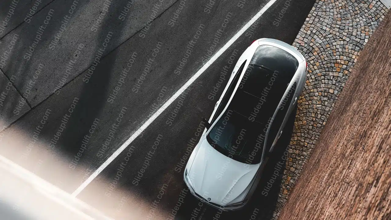 White Car on Gray Road With Cobblestone Sidewalk background image & Google Slides Theme