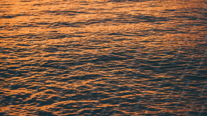 Amber Water Ripples Background Image