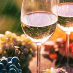 Amber Wine Glasses And Grapes Background Image & Google Slides Theme