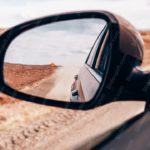 Black Side Mirror Brown Desert Road Background Image & Google Slides Theme