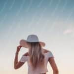 Blue Sky White Hat Woman Background Image & Google Slides Theme