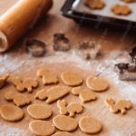 Brown Beige Gingerbread Cutouts Rolling Pin Wooden Table Background Image & Google Slides Theme