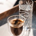 Brown Coffee Glass Crystal Clear Water Glass Background Image & Google Slides Theme