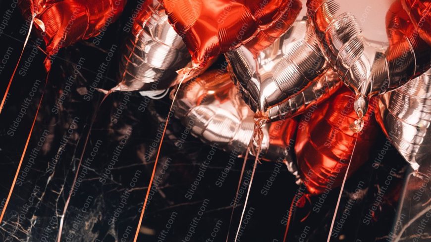 Crimson And Silver Heart Shaped Balloons Background Image