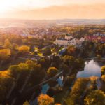 Golden Autumnal Trees Castle Sunset Background Image & Google Slides Theme