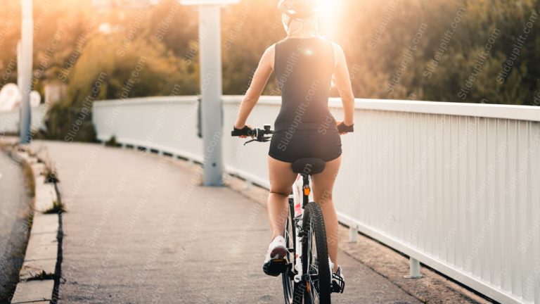 Golden Woman Cycling Warm Evening Background Image & Google Slides Theme