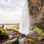 Green Brown Waterfall People Background Image & Google Slides Theme