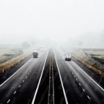 Grey Black Highway Vehicles Foggy Background Image & Google Slides Theme