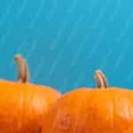 Orange Pumpkins Blue Background Image & Google Slides Theme