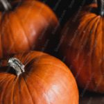 Orange Pumpkins Dark Background Image & Google Slides Theme