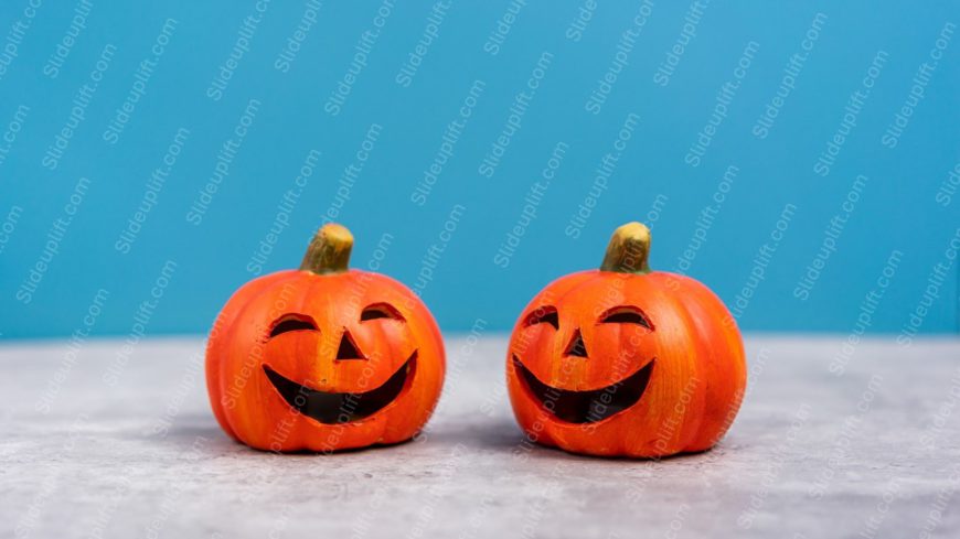 Orange Smiling Pumpkins Blue Background Image