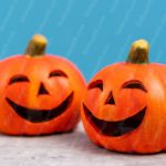 Orange Smiling Pumpkins Pale Blue Background Image & Google Slides Theme