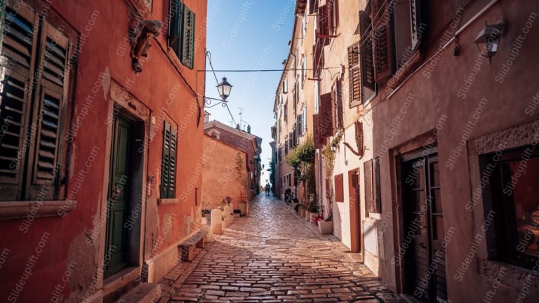 Orange Terracotta Buildings Cobblestone Street Background Image & Google Slides Theme