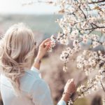 Pastel Blue Shirt Woman Blossoming Tree Background Image & Google Slides Theme