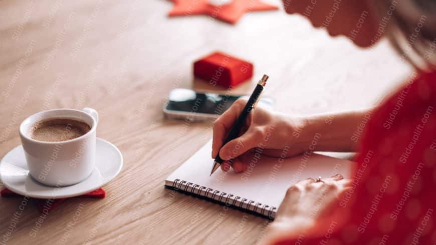 Red Polka Dot Sleeve Writing Hand White Cup Wooden Table Background Image