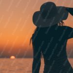 Sunset Orange Woman Hat Silhouette Seascape Background Image & Google Slides Theme