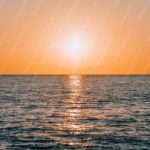 Sunset Yellow Orange Sun Reflection Sea Background Image & Google Slides Theme