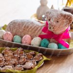 Tan Lamb Cake Multi Colored Eggs Gingerbread Cookies Wooden Table Background Image & Google Slides Theme