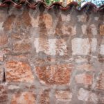 Terracotta Brown Brick Wall Background Image & Google Slides Theme