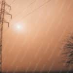 Warm Amber Electricity Pylon And Tree Silhouette Background Image & Google Slides Theme