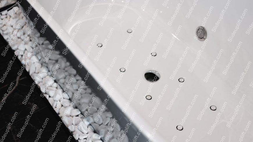 White Bathtub Pebbles Black Background Image