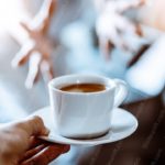 White Coffee Cup Hand Human Figure Blue Toned Background Image & Google Slides Theme