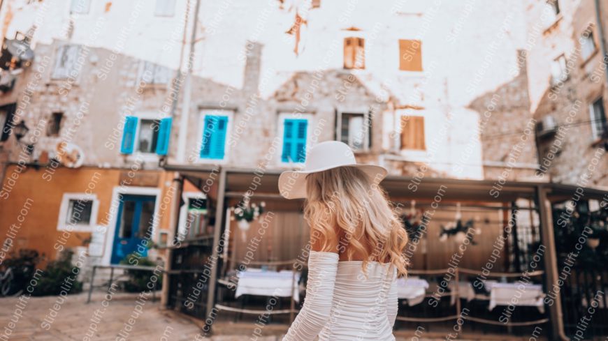 White Hat Woman Orange And Blue Buildings Background Image